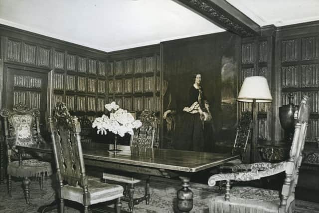 Heavily panelled dining room was home to William and Mary chairs and Charles II chairs in this 1962 photograph