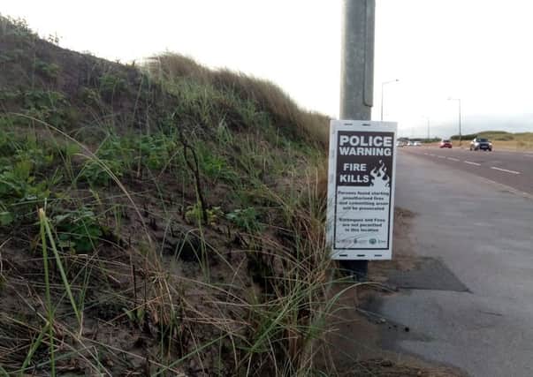 Police warning signs on Clifton Drive North, St Annes
