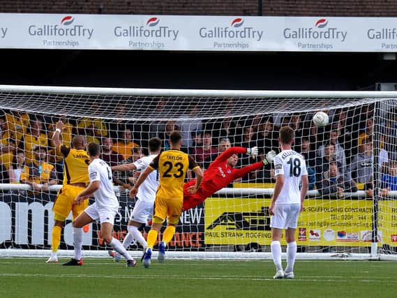 Fylde keeper Jay Lynch pulls off an outstanding save at Sutton    Picture: STEVE MCLELLAN