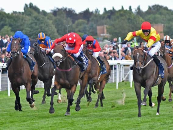 Alpha Delphini ridden by Graham Lee (right) wins the Group 1 Nunthorpe Stakes by a nose from Mabs Cross and Tom Eaves (centre) at York  on Friday.
Picture: Brian Clark