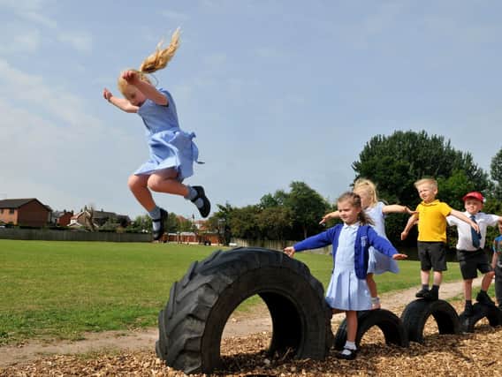 Children playing at Carleton Green Community Primary School. Picture by Neil Cross