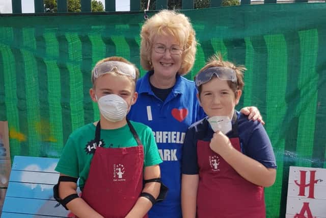 Kian Sudder, 8, Karen Pennington, secretary of Friends of Highfield Park and Archie Dickson, 12.