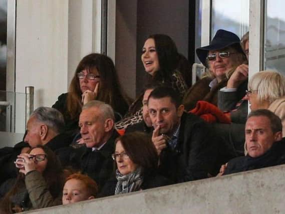 Christopher pictured with her father Owen Oyston