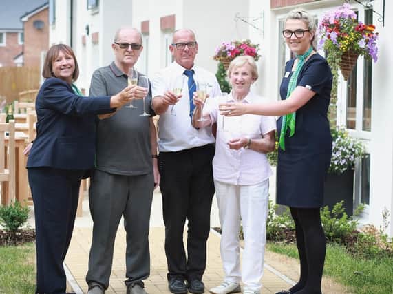 McCarthy & Stone sales executive Colette Grainger, site manager Dave Plant and customer sales executive Beth Halls with new homeowners William Taylor and Jean Hewitt at Burrstone Grange, Thornton
