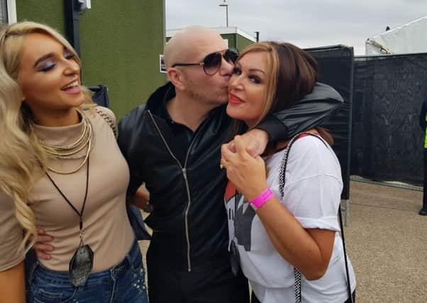 Daughter and mother April and Fay Hanson met rapper Pitbull backstage at the Britney concert in Blackpool