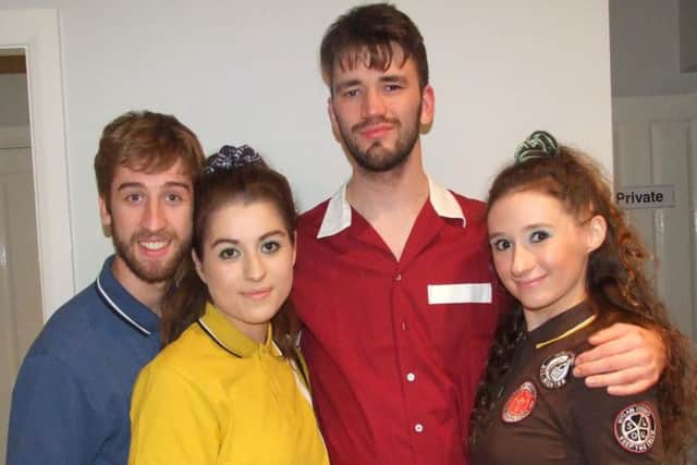 Jordan Flemming, left, with the cast of Once Upon A Time In Wigan