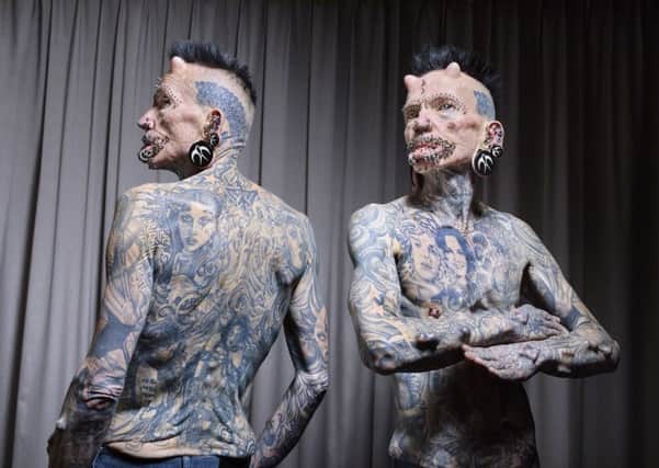 Rolf Buchholz who holds the record for the most Body Modifications (male) as he appears in the latest edition of Guinness World Records.  Photo credit: Paul Michael Hughes/Guinness World Records/PA Wire