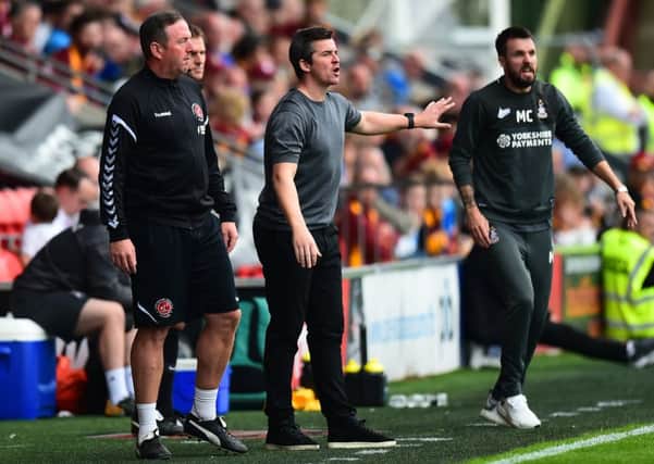 Fleetwood Town manager Joey Barton reacts