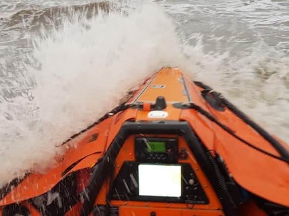 Man led to safety after found in sea at Blackpool