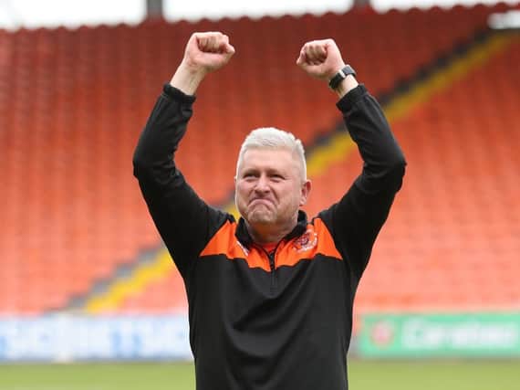McPhillips celebrating at the full-time whistle