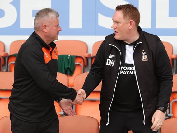 Hopkin shakes hands with Terry McPhillips before kick off