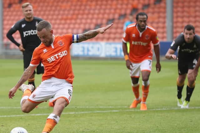 Jay Spearing scores his first goal in a Blackpool shirt to reduce the arrears