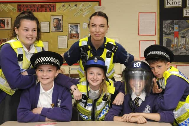 A previous Primary Futures event at Stanley Primary School. PCSO Jen Fisher with pupils Kci Quinn, Cody Plant, Jodie Meades, Alfie Housley and Tyler Roberts, all aged 11.