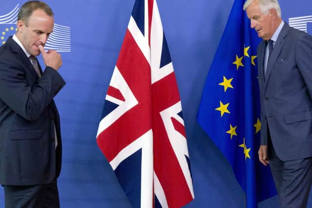 Britain's Secretary of State for Exiting the European Union Dominic Raab, left, and EU chief Brexit negotiator Michel Barnier