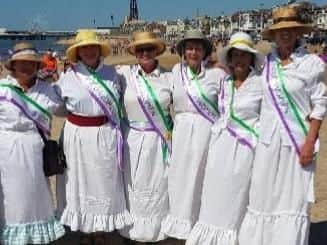 The protest outside Parliament will have a suffragette theme.