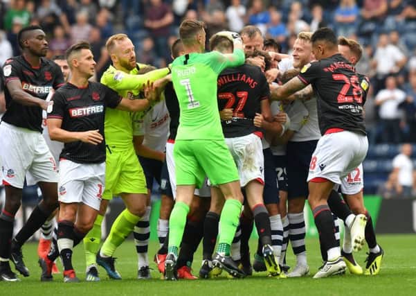 Preston and Bolton players clash at full-time earlier this month