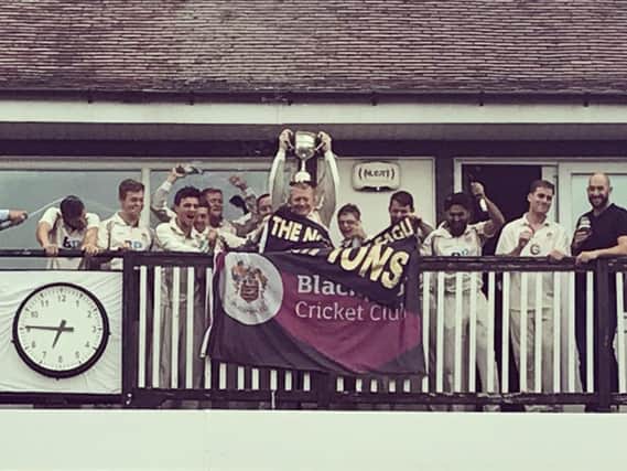 Blackpool CC proudly display the champions' trophy at Stanley Park