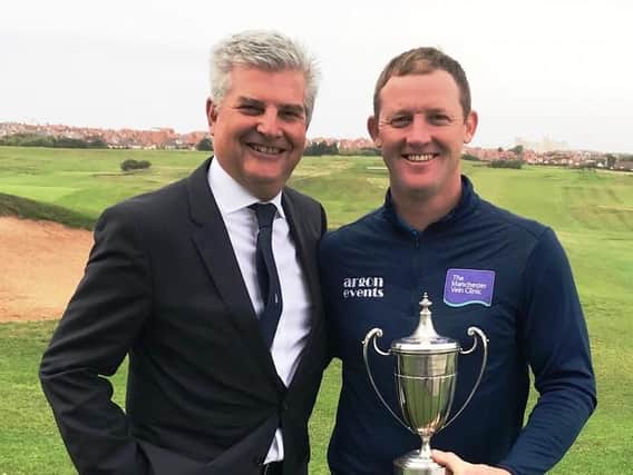 David Hannis, CEO of James Brearley, presents the Lancashire Open trophy to
Steve Parry at Blackpool North Shore