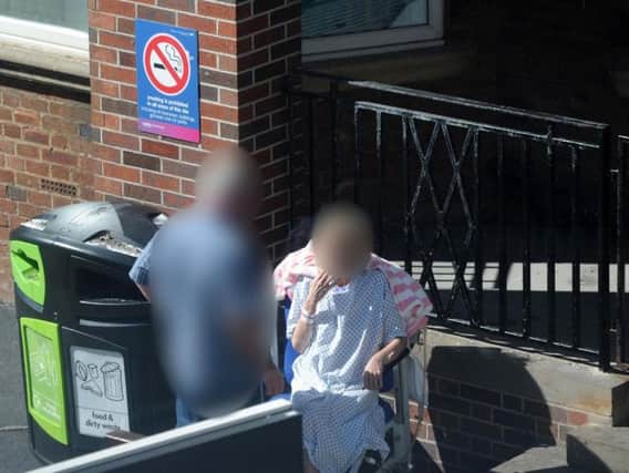 Hospital bosses are concerned about smoking in the grounds of the hospital