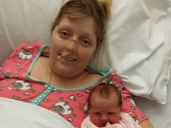 Jenny Moss with her baby Molly Hope