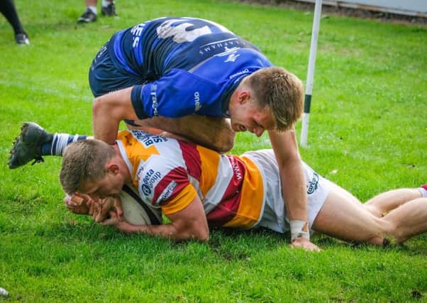 Tom Grimes scores the opening try for Fylde against Macclesfield