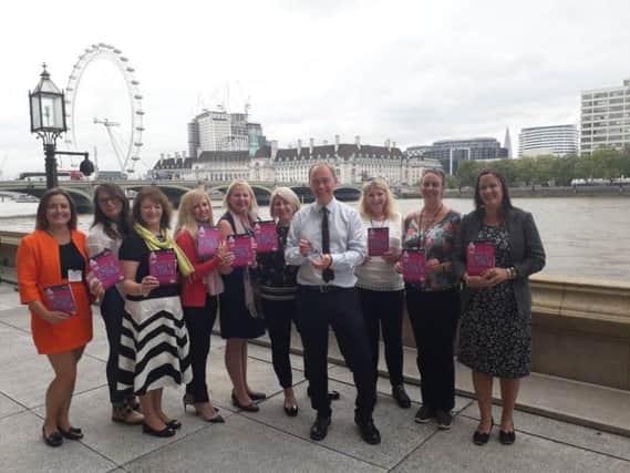 The EVAs awards finalists with MP Tim Farron on the banks of the Thames at Westminster