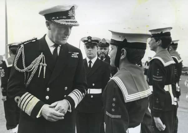 Admiral Cassidi chats to a member of Fleetwood sea cadets during a visit to their HQ, in 1982