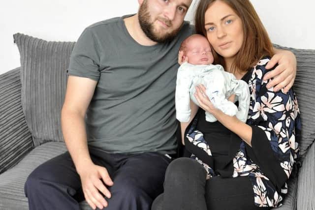 Graeme Abbott with sister Nicola Abbott and baby Archer. Picture: SWNS