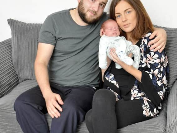 Graeme Abbott with sister Nicola Abbott and baby Archer. Picture: SWNS