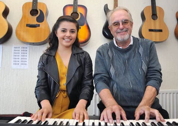Former Blackpool Music Academy student Caroline Cooper is returning to the Waterloo Road school as a tutor, having graduated with distinction from Leeds College of Music.
Keyboard tutor Caroline with the academy founder John Shaw.  PIC BY ROB LOCK
7-9-2018