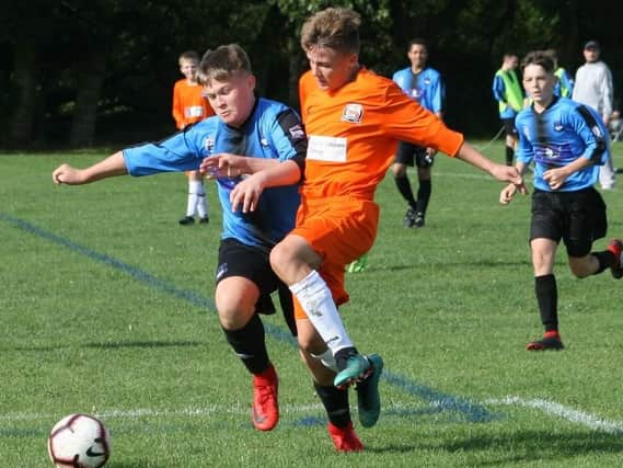 Under-15 action between FC Rangers Blues and AFC Blackpool  Picture: KAREN TEBBUTT