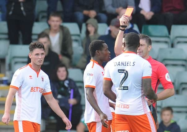 Donervon Daniels was shown a red card at Plymouth Argyle