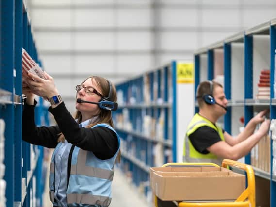 Warehouse pickers using Voiteq's voice technology