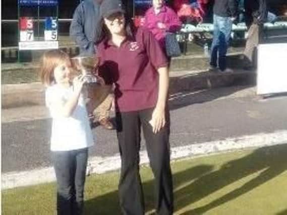 Women's Waterloo winner Hannah McDonald with her daughter