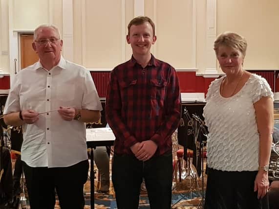 David and Lynda Brock with Blackpool Brass Bands musical director, John Pearson.