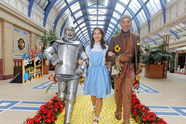 Kelvin Fletcher as Tin Man, Holly Tandy as Dorothy, and Keiran McGinn as Scarecrow at the launch photocall for Wizard Of Oz at the Opera House, Blackpool