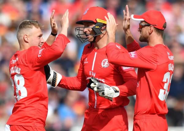 Lancashire Lightning's Matthew Parkinson celebrates taking the wicket of Worcestershire Rapids' Ross Whiteley during the Vitality T20 Blast semi-final