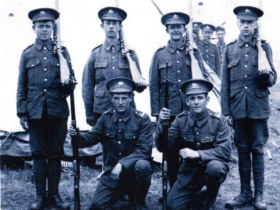 Pte Sam Oliver, 18, standing second from right, is one of 102 men from the 1/4th Kings Own Royal Lancaster Regiment who fell at Guillemont and have no known grave. Photo: Graham Lindow