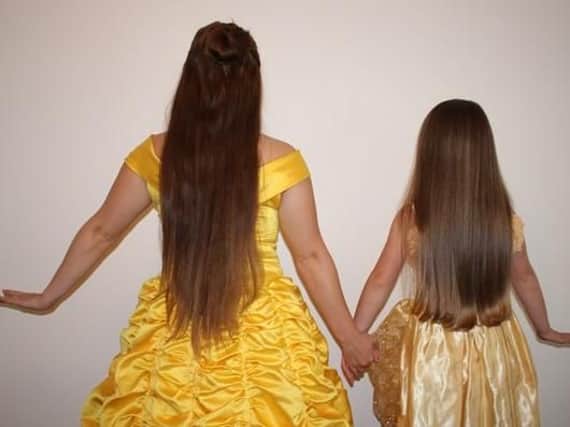 The sisters will be cutting off their hair for charity.