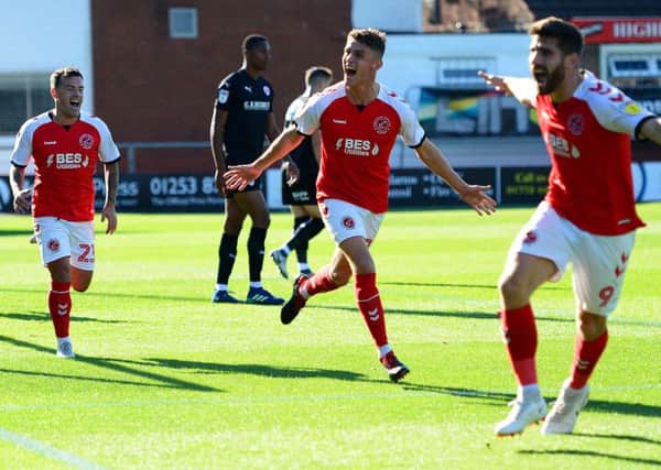 Fleetwood Town's Harrison Biggins celebrates scoring