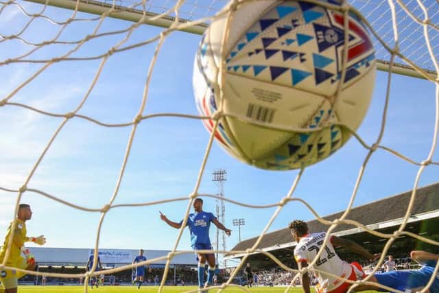 Armand Gnanduillet scores Blackpool's first goal at Peterborough