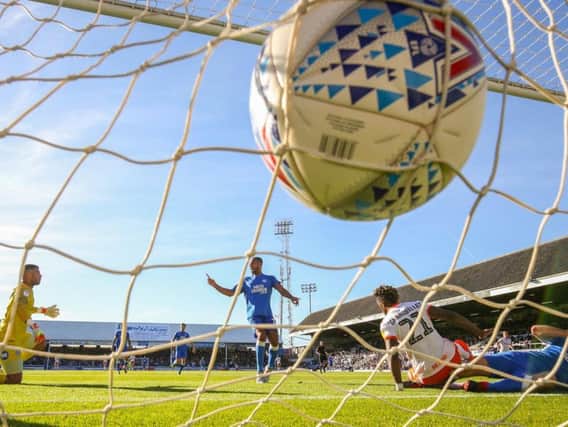 Armand Gnanduillet scores Blackpool's first goal at Peterborough