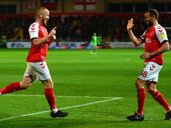 Paddy Madden celebrates his goal against Wycombe with James Wallace (right)