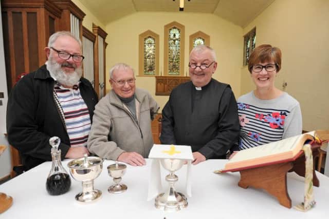L-R Charles Crosbie, Alan Shelley, Father Peter Ennion and Michelle Broughton.