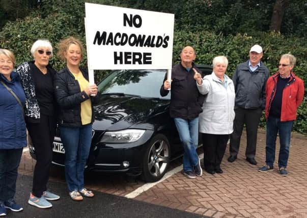 Protesters make a point in their opposition to a proposed new McDonald's restaurant in Cleveleys