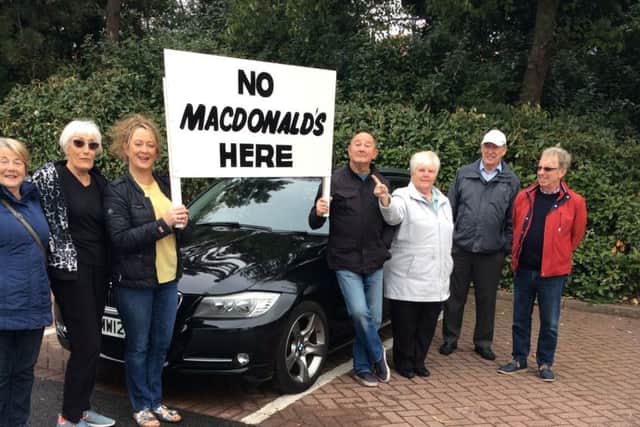 Protesters make a point in their opposition to a proposed new McDonald's restaurant in Cleveleys