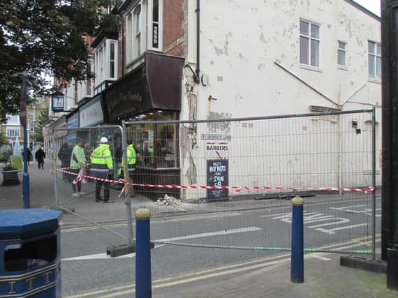 Engineers were assessing the damage to the shop (Picture: Sarah Dunn)