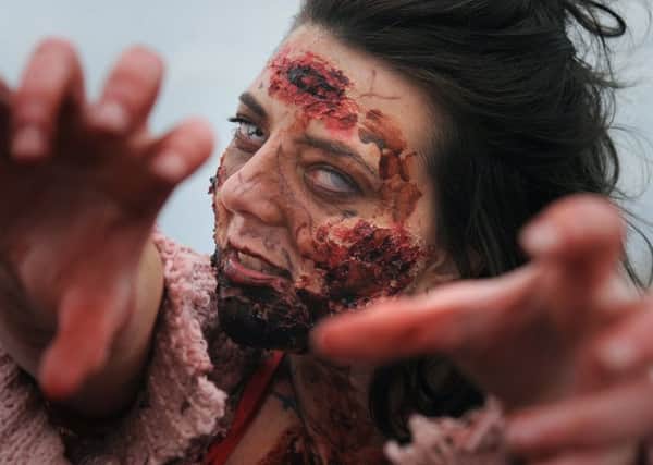 The Blackpool film-makers who have created the zombie film Redcon-1 organised a 'zombie walk' along Blackpool promenade to promote their movie.
Shelley Cross with convincing make-up.  PIC BY ROB LOCK
7-10-2018