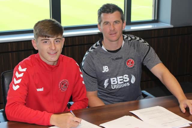 Ryan Rydel with Town boss Joey Barton