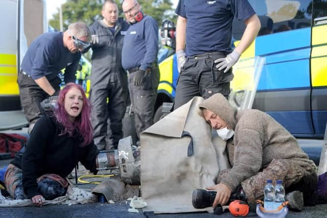 Proesters stage a lock-on protest